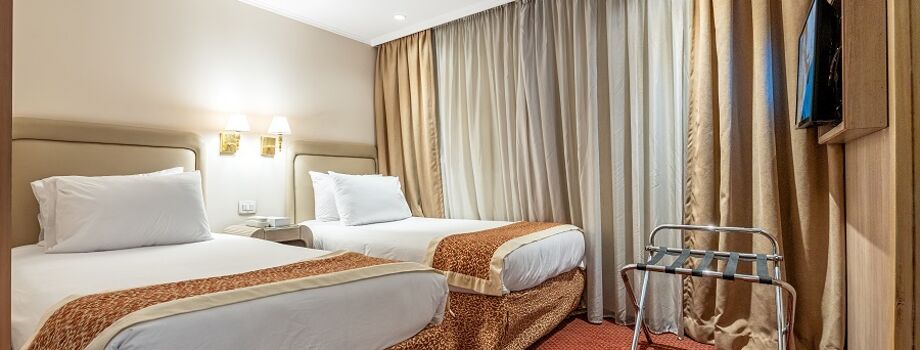 Спальная комната в каюте Сьют